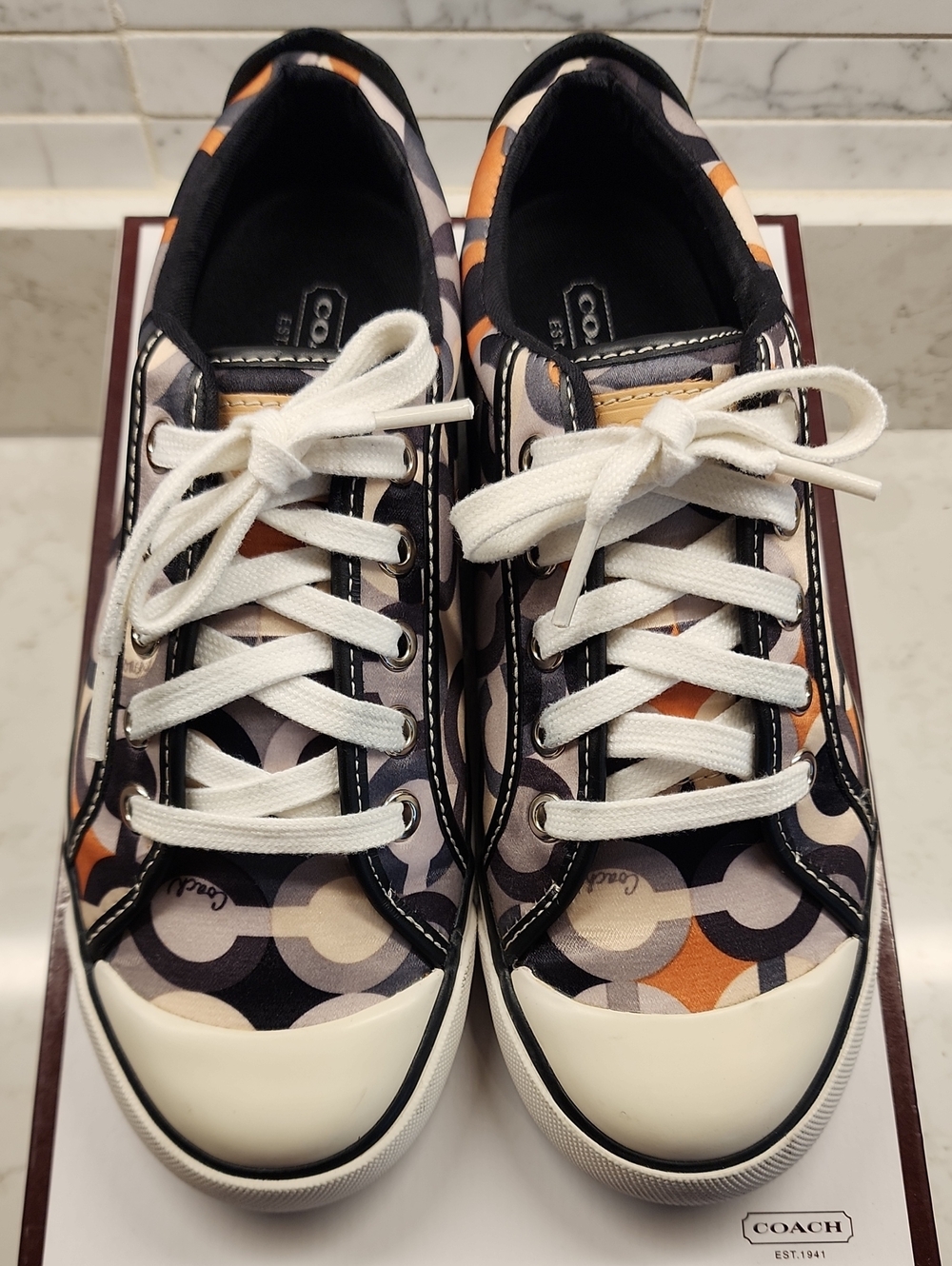 Coach Circle Logo Canvas Low Top Sneakers in Black, Cream & Orange